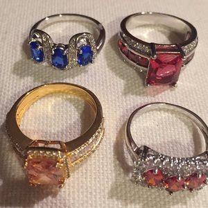 4 CZ rings with simulated stones